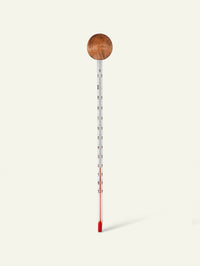 Bild von einem Holzthermometer, Haarpflege-Ausrüstung von Khadi